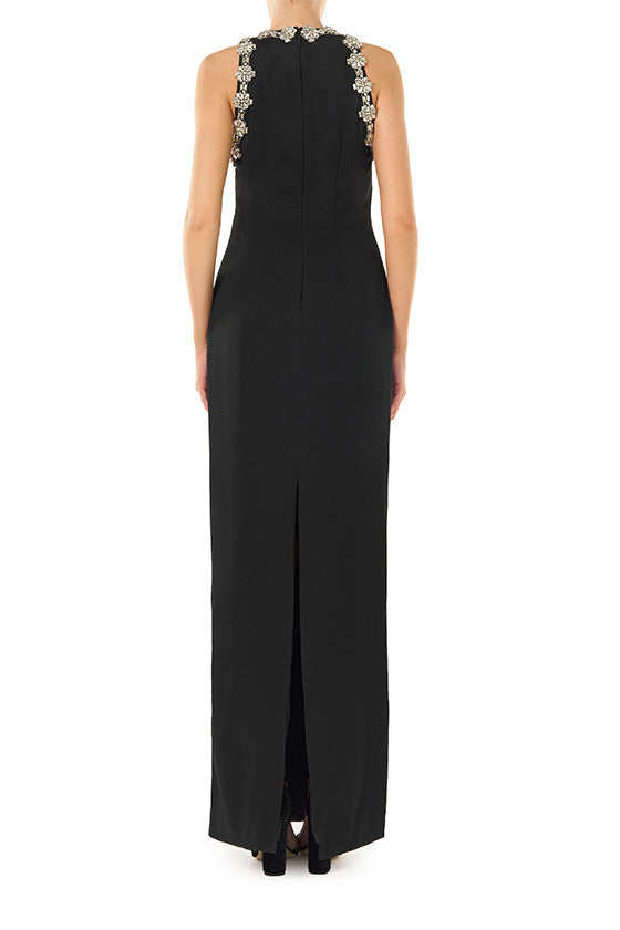 Monique Lhuillier noir sleeveless, crepe evening gown with jewel neckline and crystal embroidery detail.