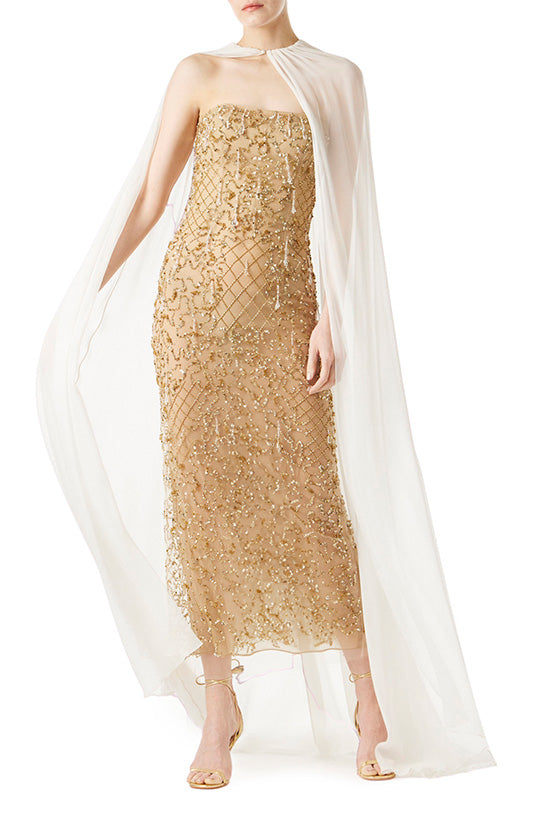 Monique Lhuillier gold embroidered column gown with silk white chiffon cape.
