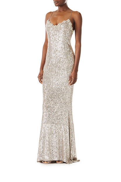 Monique Lhuillier silver sequin slip gown with spaghetti straps.