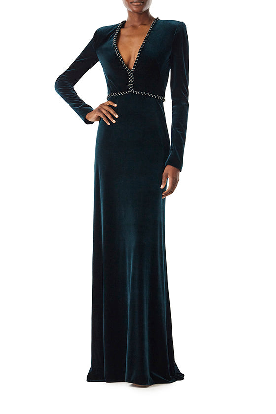 Monique Lhuillier long sleeve gown with deep v-neck and embroidery trim in dark teal velour.