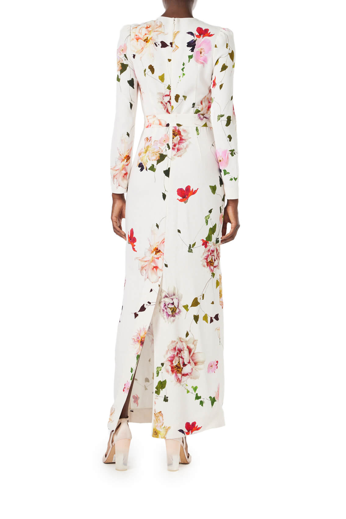 Monique Lhuillier jewel neck, tea-length gown with long sleeves and self-tie sash in silk white floral fabric.