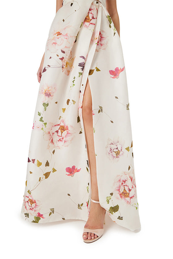 Monique Lhuillier strapless gown with sweetheart neckline and high leg slit in silk white floral gazar.