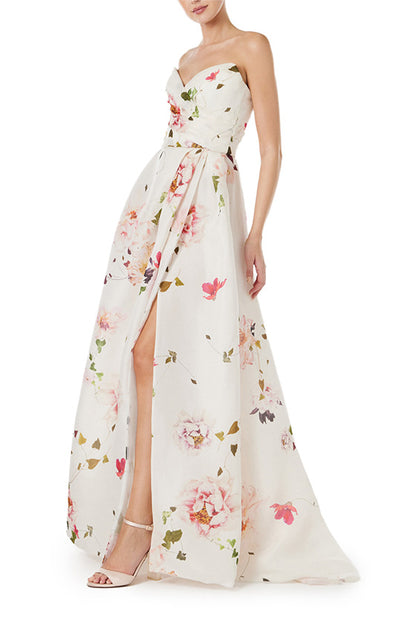 Monique Lhuillier strapless gown with sweetheart neckline and high leg slit in silk white floral gazar.