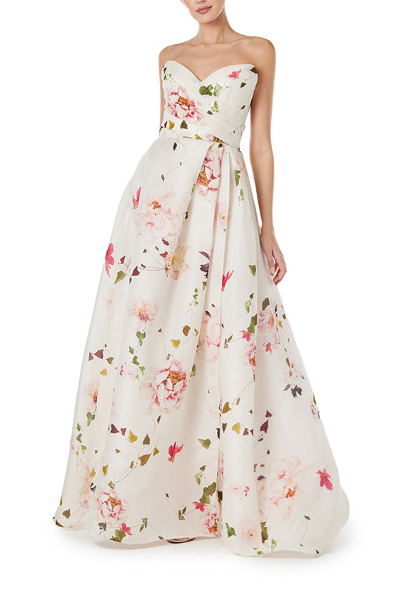 Monique Lhuillier strapless gown with sweetheart neckline and high leg slit in silk white floral gazar.
