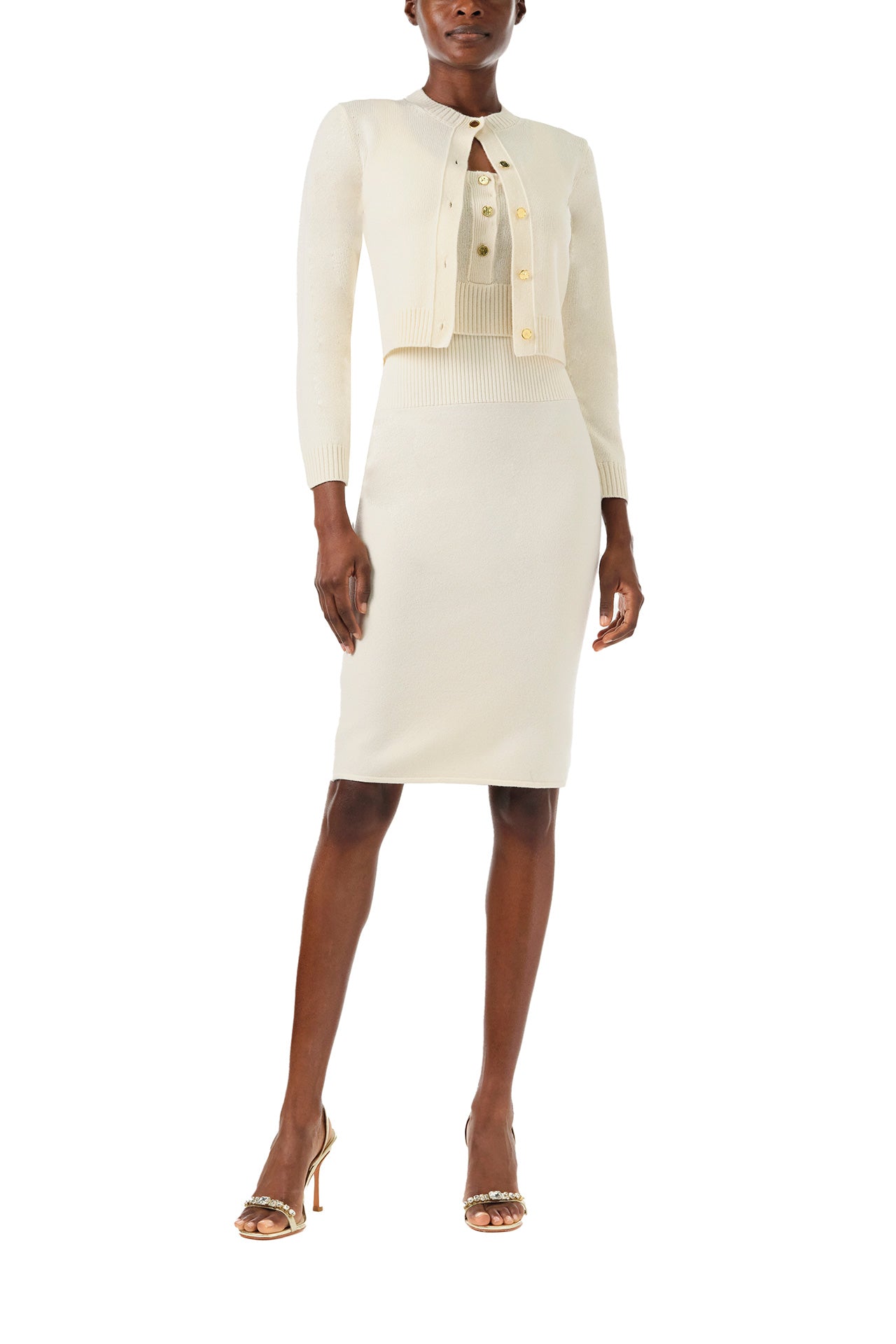Monique Lhuillier Spring 2024 white cropped cashmere tank with scoop neck and gold button closure - front with cardigan.