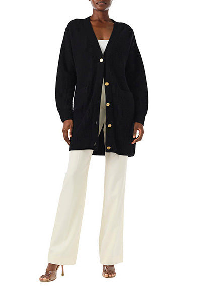 Monique Lhuillier Spring 2024 black chunky long cashmere cardigan with gold buttons - front closed.