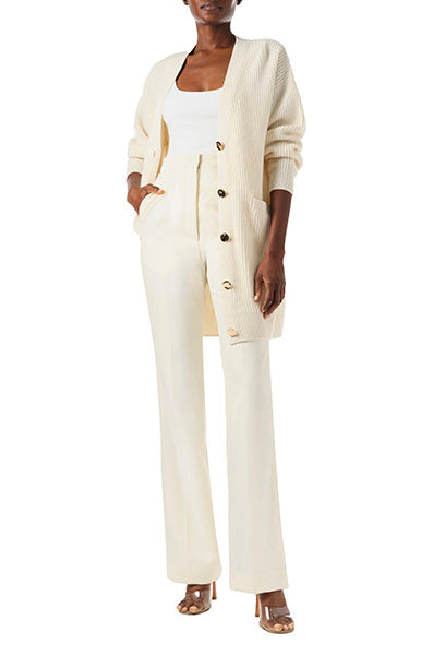 Monique Lhuillier Spring 2024 white cashmere long chunky cardigan with gold buttons - front.