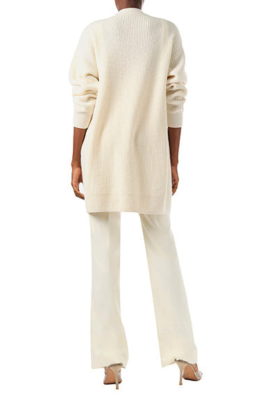 Monique Lhuillier Spring 2024 white cashmere long chunky cardigan with gold buttons - back.