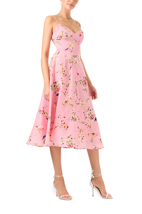 Monique Lhuillier Spring 2024 pink floral print linen cocktail dress with sweetheart neckline, flared skirt and pockets - right side.