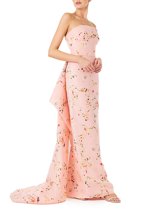 Monique Lhuillier strapless column gown in pink peony flora gazar fabric with tufted bustle train.