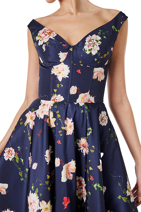 Monique Lhuillier navy floral midi dress with off the shoulder neckline, fit & flare skirt and pockets.