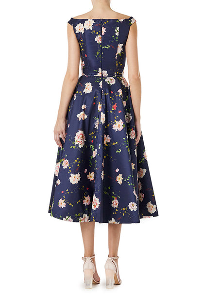 Monique Lhuillier navy floral midi dress with off the shoulder neckline, fit & flare skirt and pockets.