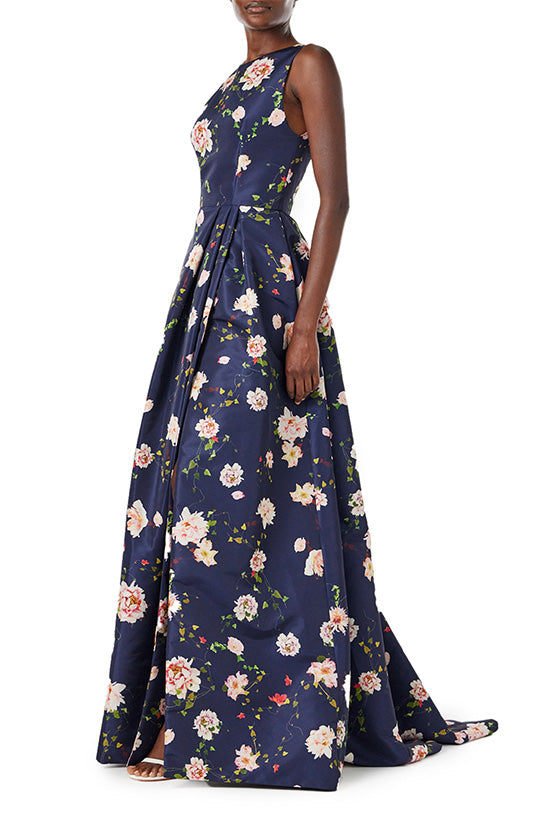 Monique Lhuillier navy floral silk faille gown with jewel neckline and high front leg slit.