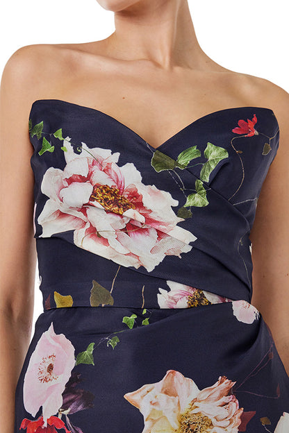 Monique Lhuillier navy floral gazar gown with strapless, sweetheart neckline and train.