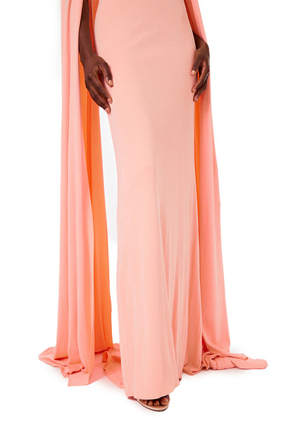 Monique Lhuillier melon colored crepe-back satin gown with attached cape and keyhole bodice.