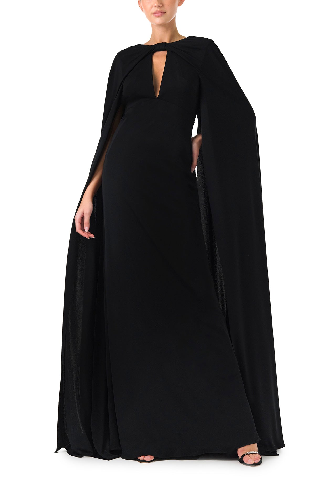 Monique Lhuillier Spring 2024 black crepe-back satin gown with attached cape and keyhole bodice - front.