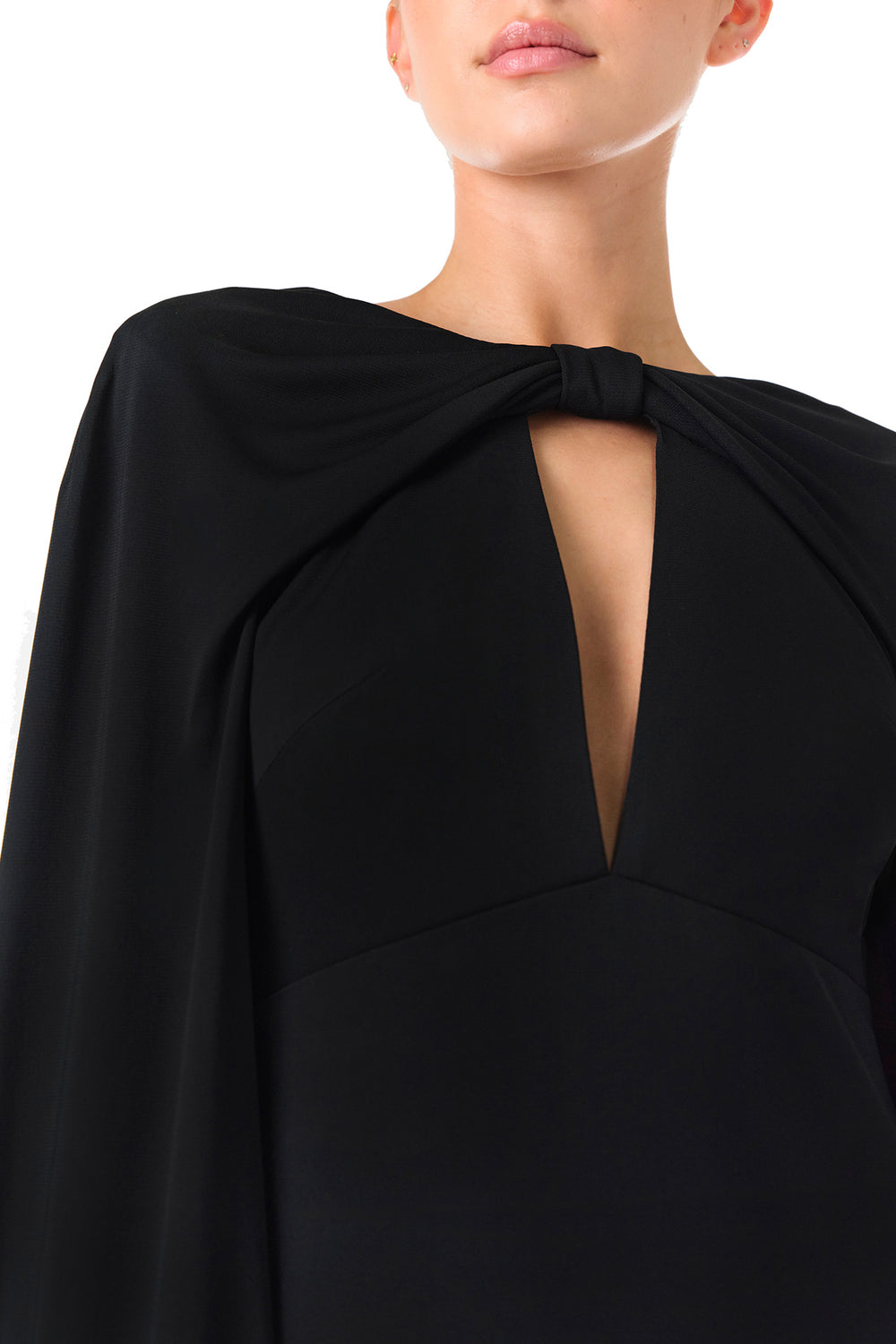 Monique Lhuillier Spring 2024 black crepe-back satin gown with attached cape and keyhole bodice - keyhole detail.