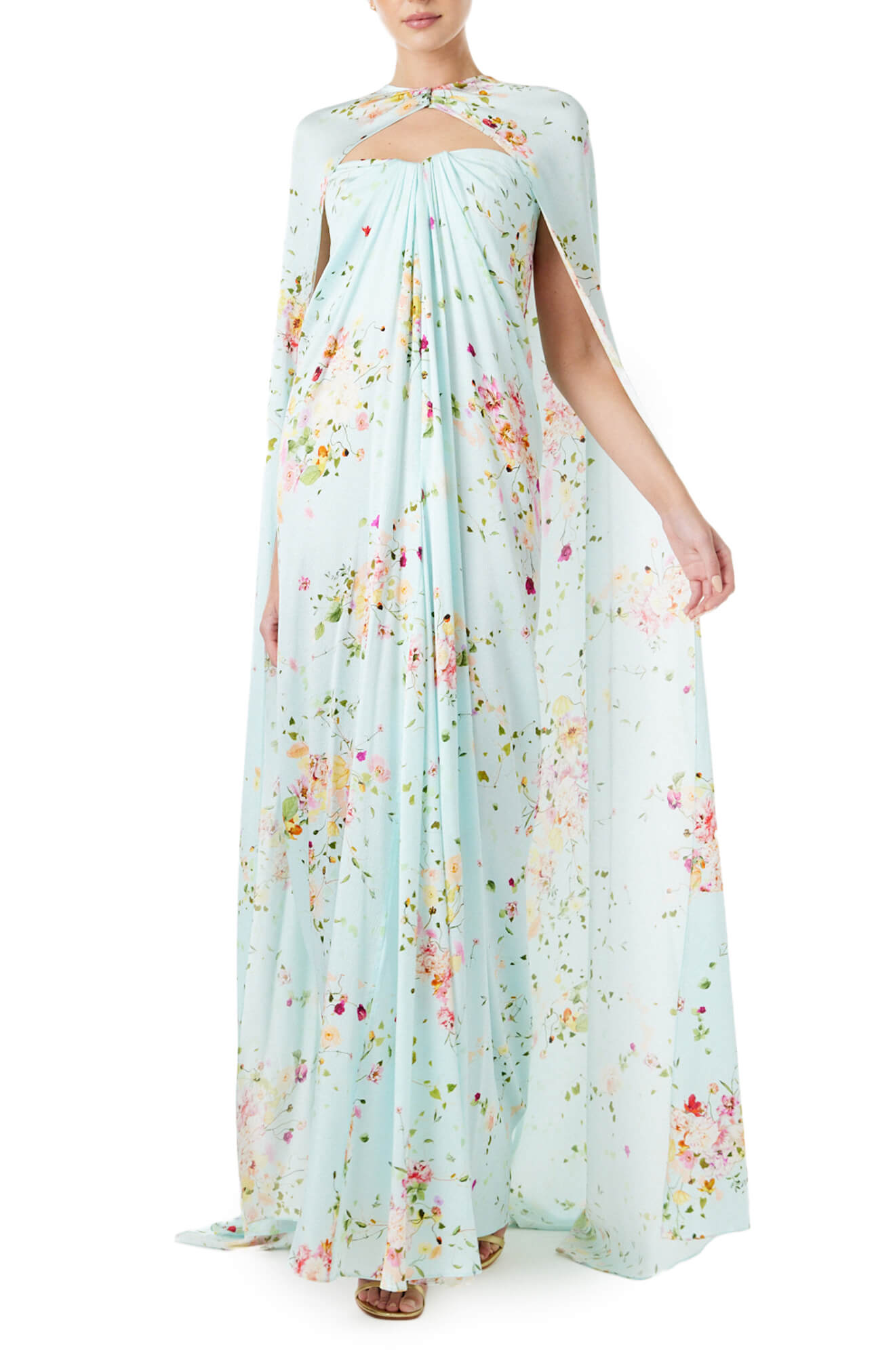 Monique Lhuillier strapless draped gown and cape in pistachio floral print fabric.
