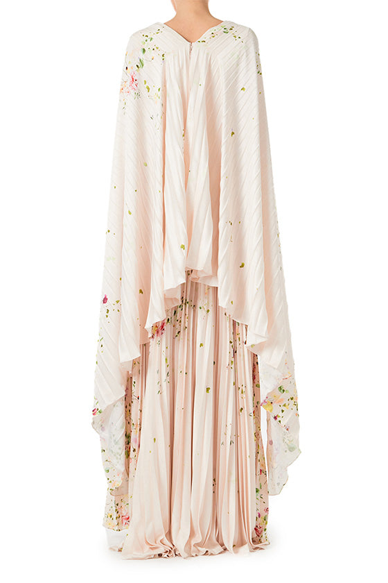 Monique Lhuillier floral printed plisse caftan with deep v neckline and cape sleeves.