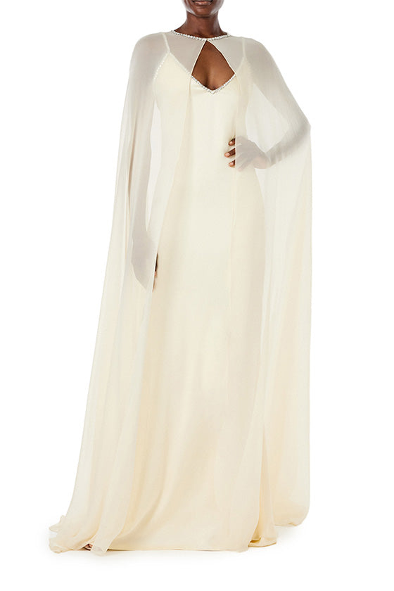 Monique Lhuillier creme satin slip gown with crystal embroidered straps and neckline.