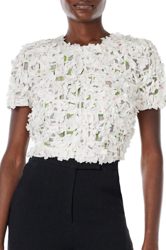 Monique Lhuillier crop top with short sleeves in silk white floral embroidery.