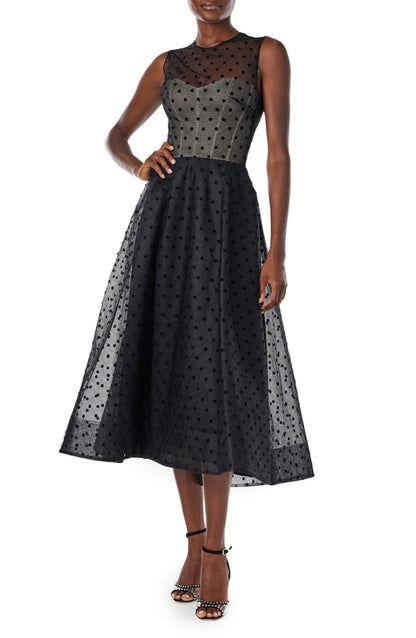 Monique Lhuillier noir dotted tulle, sleeveless jewel neck cocktail dress with caged skirt.