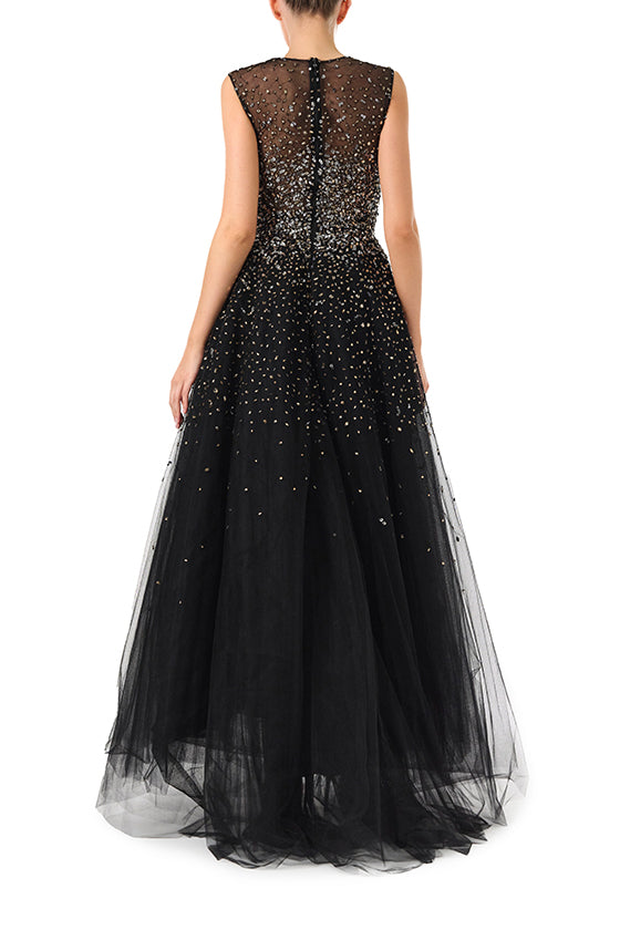 Monique Lhuillier Spring 2024 black tulle gown with metallic embroidery and high-low hem - back.