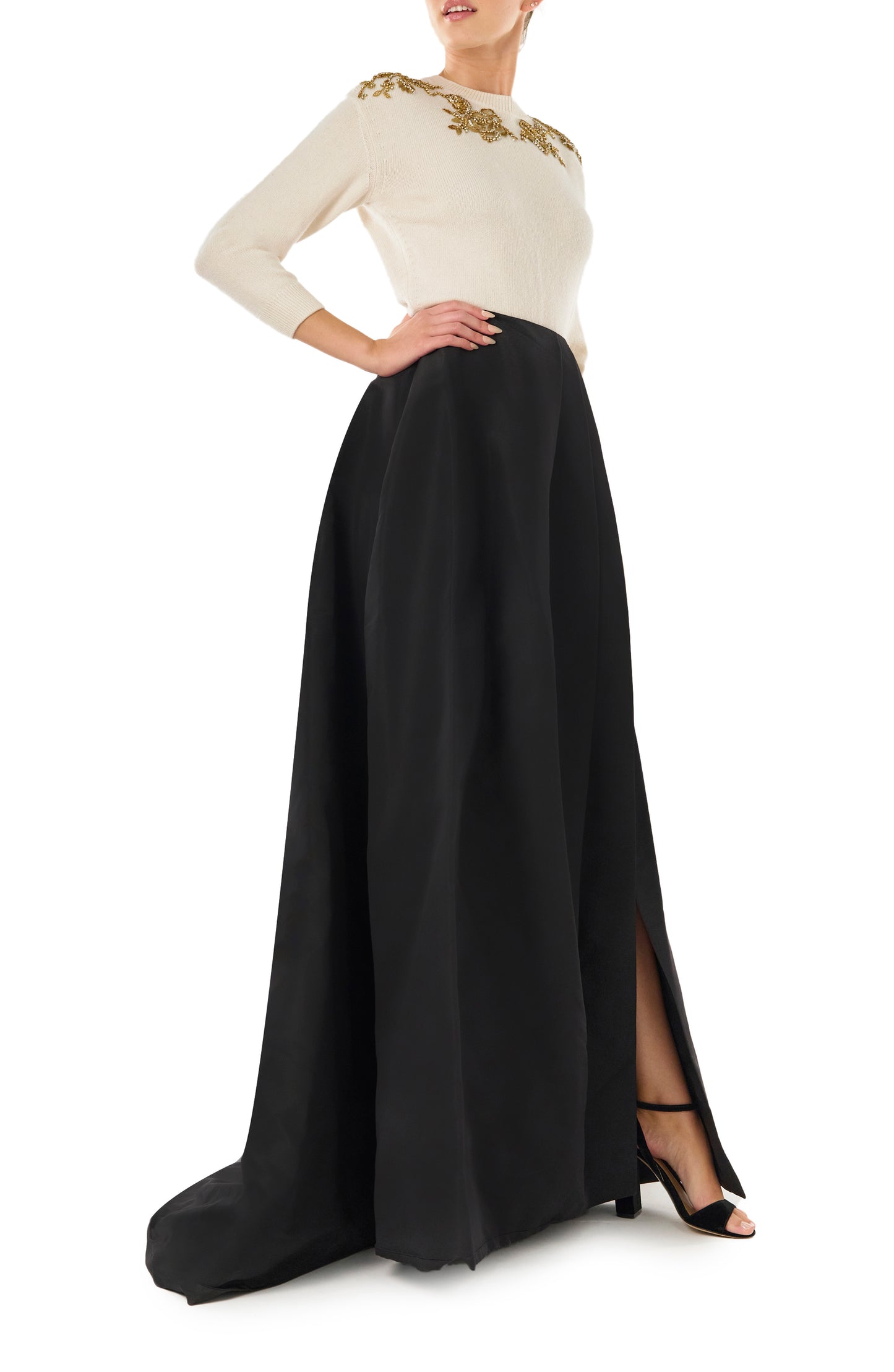 Monique Lhuillier black silk faille ball skirt with high leg slit.