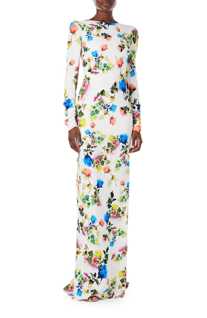 Monique Lhuillier Spring 2024 floral print long sleeve gown with open back and ruching - front..