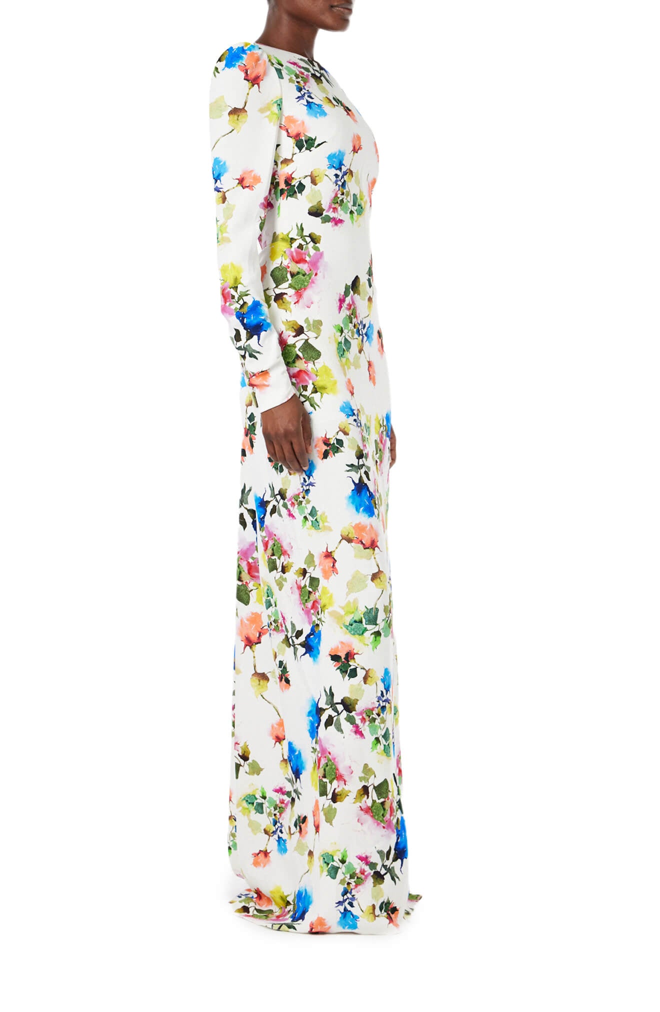 Monique Lhuillier Spring 2024 floral print long sleeve gown with open back and ruching - side one.
