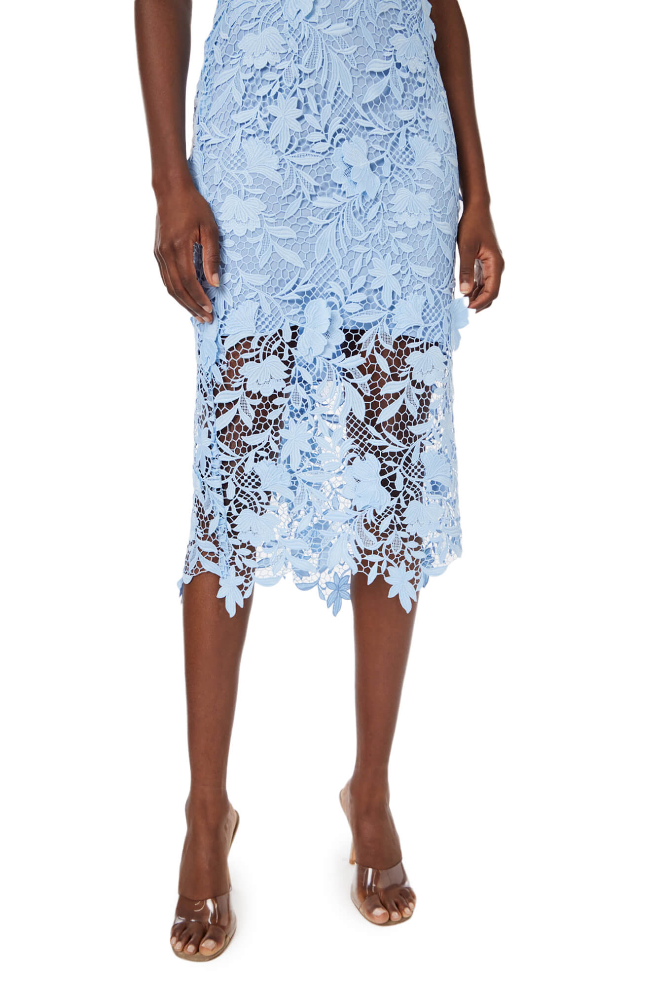 Monique Lhuillier Spring 2024 midi dress in pale blue lace with scalloped edging details.