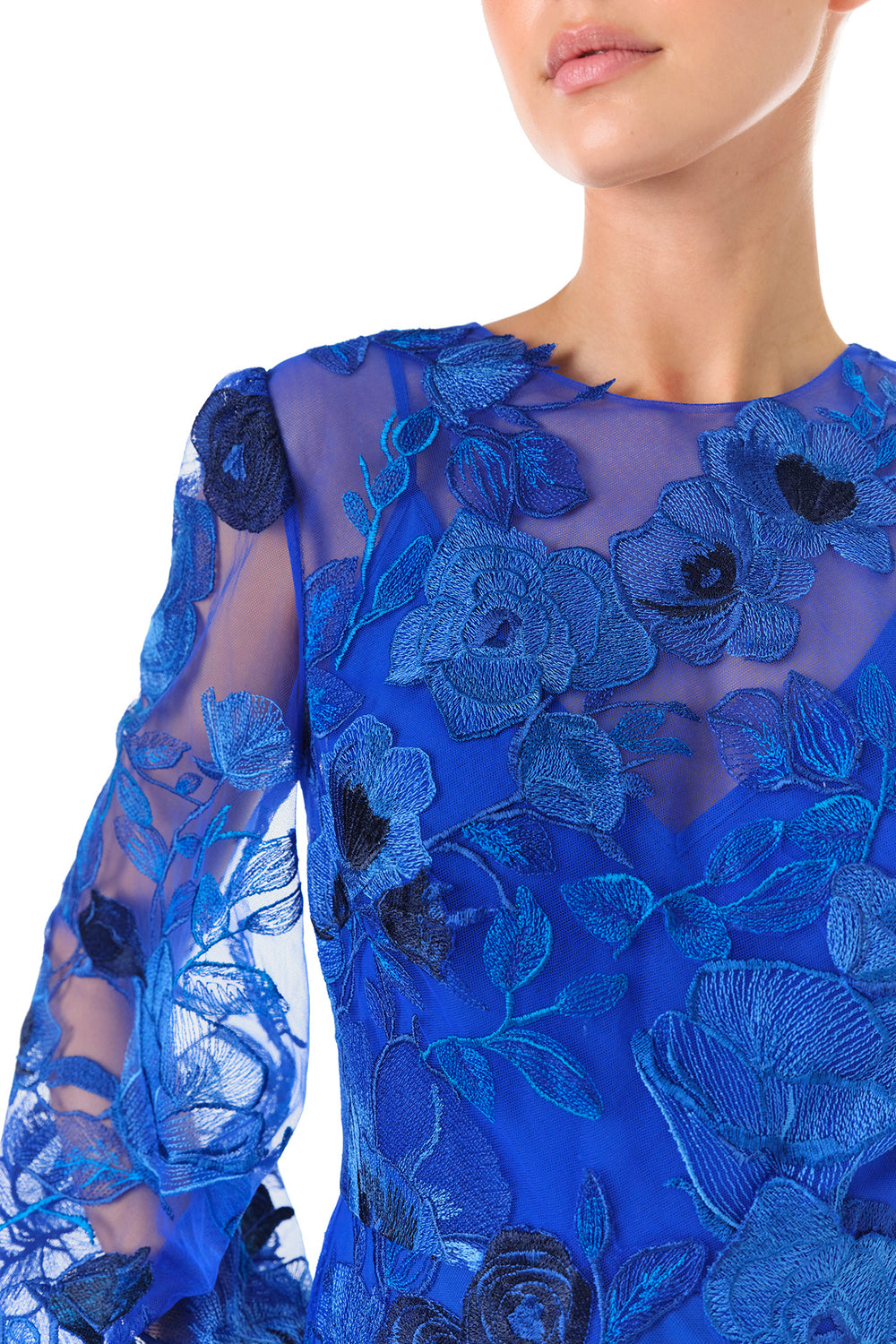 Monique Lhuilier Spring 2024 royal blue embroidered tulle long sleeve column gown with jewel neckline and detached slip lining - detail.