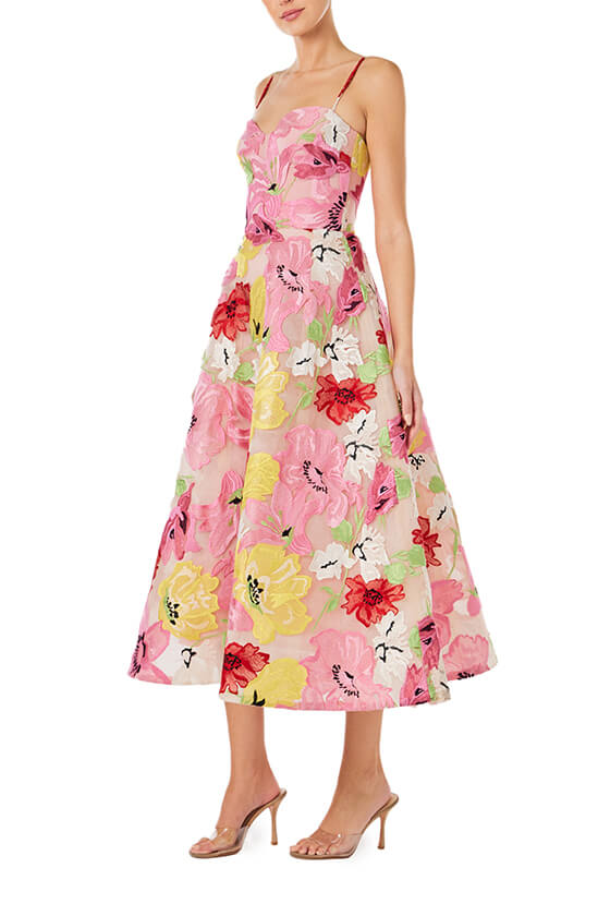 Monique Lhuillier Spring 2024 tea length dress with sweetheart neckline and spaghetti straps in raspberry yellow floral embroidery - left side.