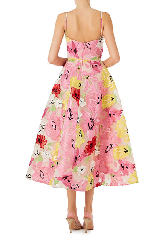 Monique Lhuillier Spring 2024 tea length dress with sweetheart neckline and spaghetti straps in raspberry yellow floral embroidery - back.