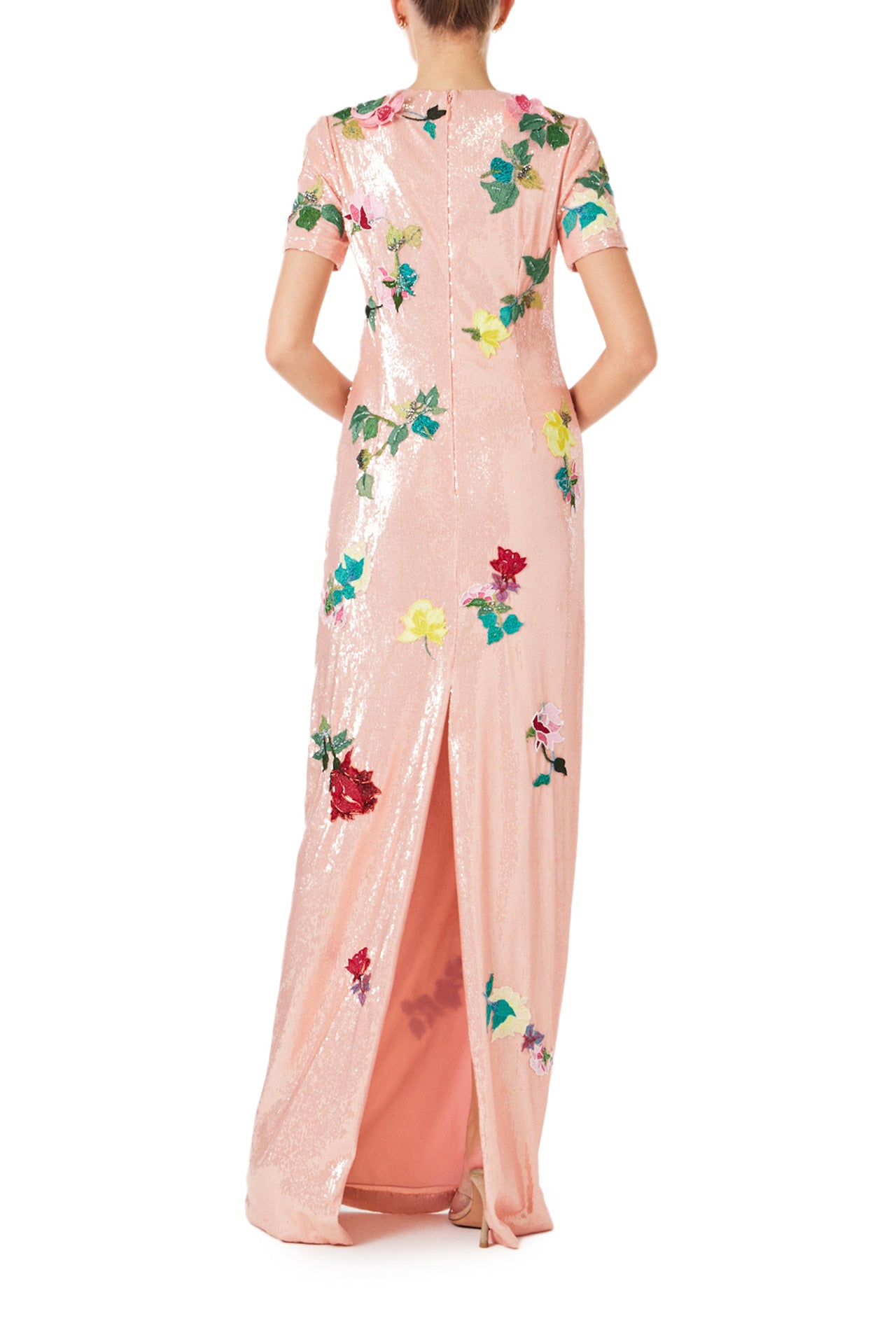 Monique Lhuillier Spring 2024 melon colored sequin gown with short sleeves, jewel neckline and multi-color floral embroidery - back.