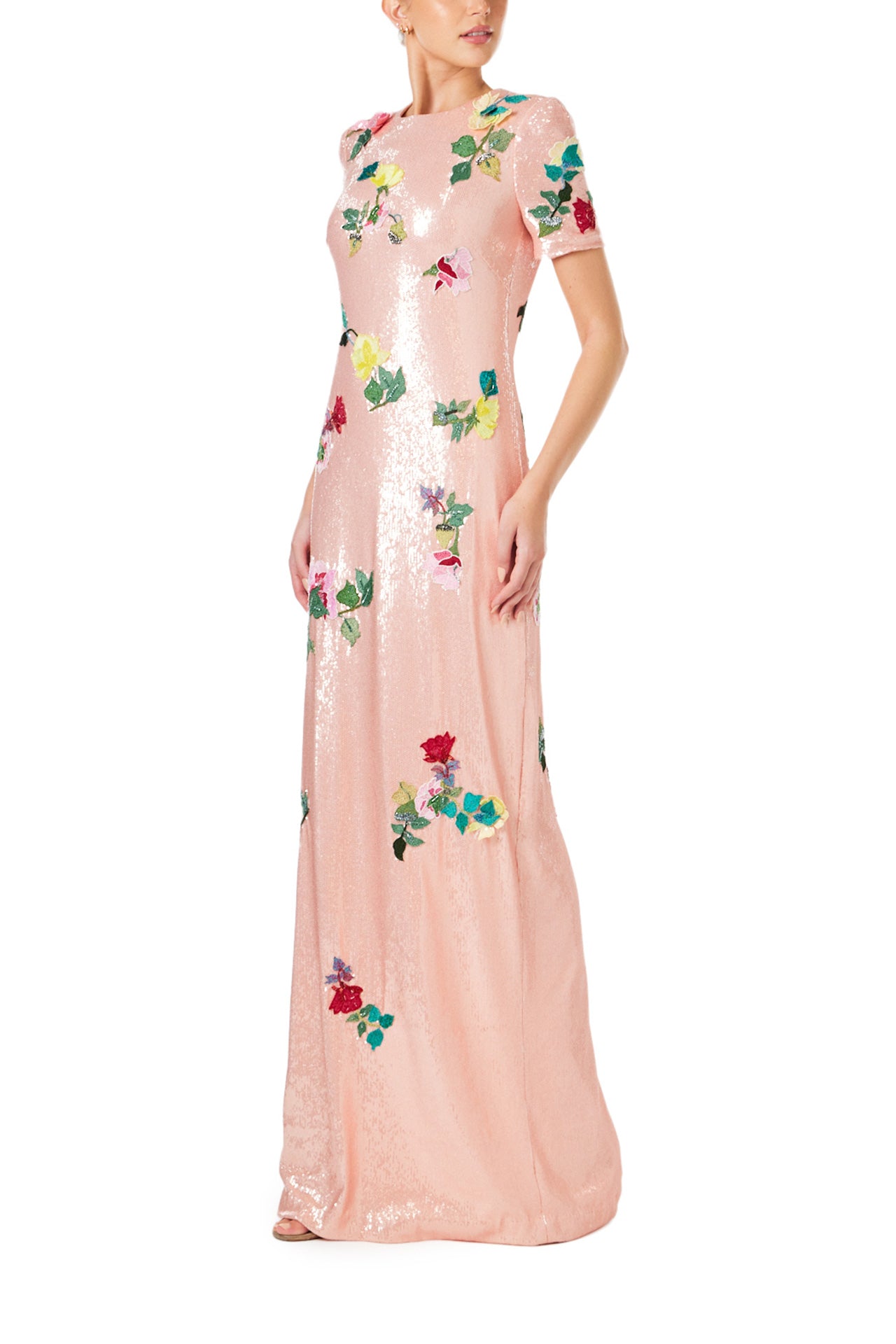 Monique Lhuillier Spring 2024 melon colored sequin gown with short sleeves, jewel neckline and multi-color floral embroidery - left side.