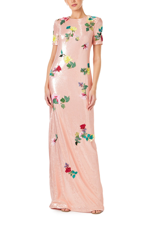 Monique Lhuillier Spring 2024 melon colored sequin gown with short sleeves, jewel neckline and multi-color floral embroidery - front.