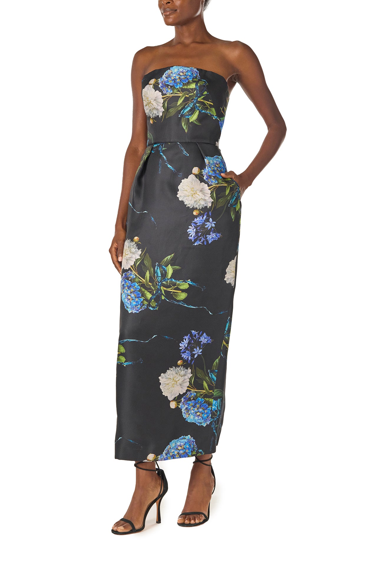 Monique Lhuillier Fall 2024 strapless, tea length gown with tulip skirt and pockets in Night Sky Hydrangea printed Gazar - side.