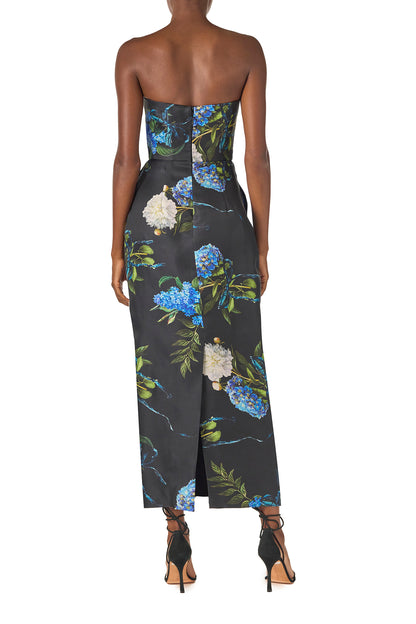 Monique Lhuillier Fall 2024 strapless, tea length gown with tulip skirt and pockets in Night Sky Hydrangea printed Gazar - back.
