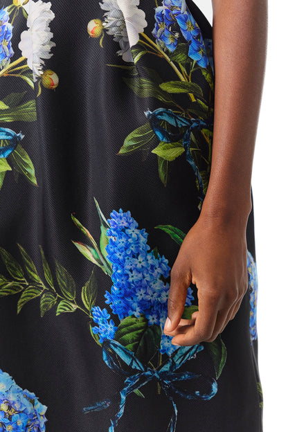 Monique Lhuillier Fall 2024 midi skirt with pockets in Night Sky Multi floral printed gazar - fabric.