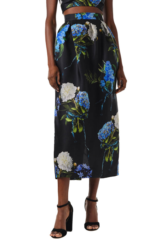 Monique Lhuillier Fall 2024 midi skirt with pockets in Night Sky Multi floral printed gazar - front crop.