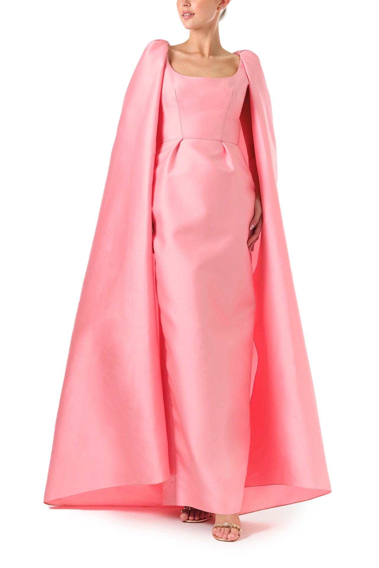 Monique Lhuillier Fall 2024 Dahlia pink mikado, sleeveless column gown with scoop neckline and attached cape - front two.