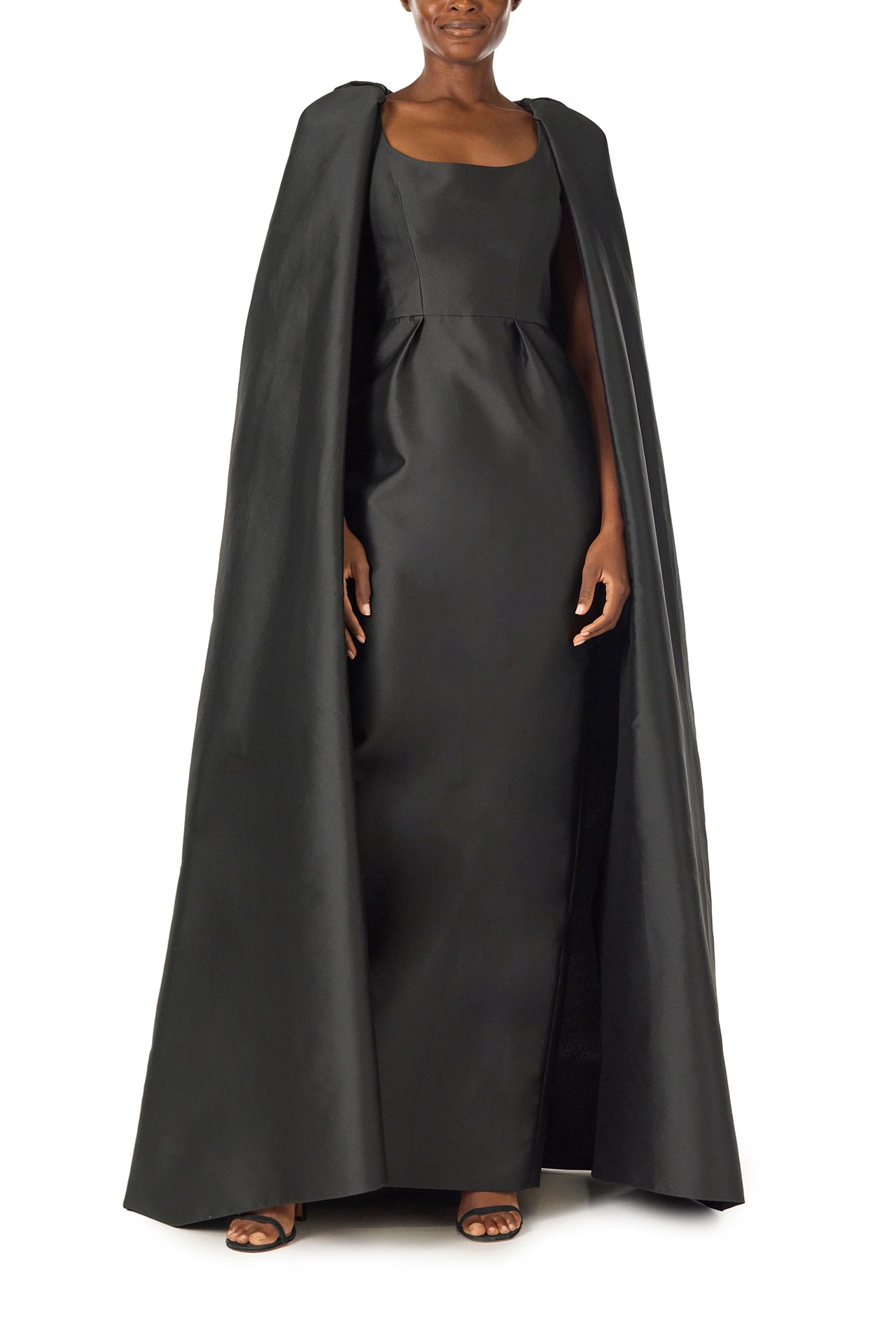 Monique Lhuillier Fall 2024 sleeveless, scoop neck column gown with integral cape in noir mikado fabric - front.