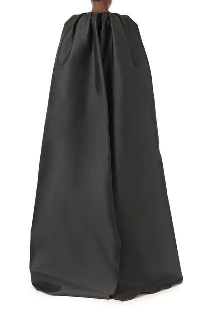 Monique Lhuillier Fall 2024 sleeveless, scoop neck column gown with integral cape in noir mikado fabric - back.