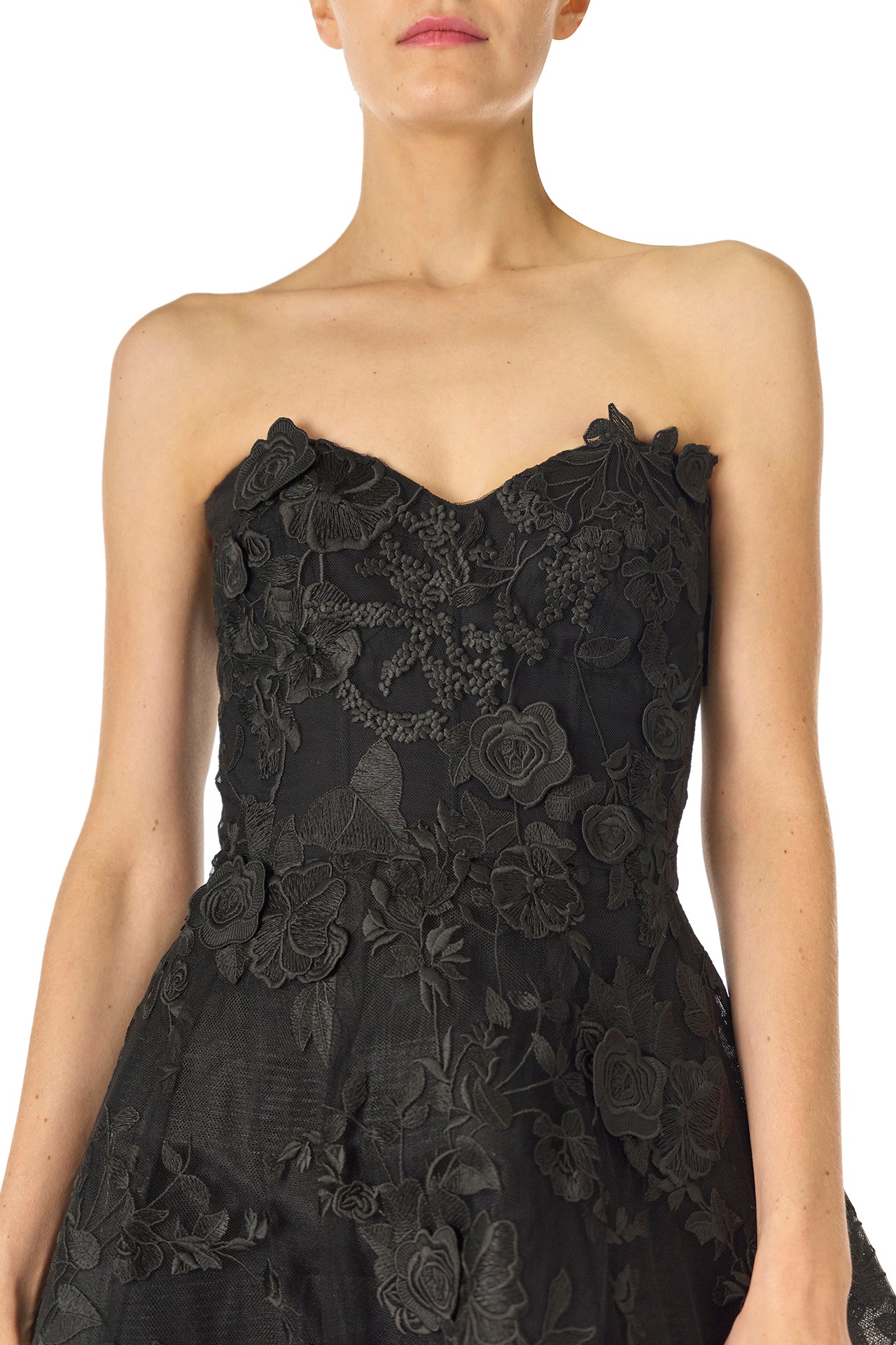 Monique Lhuillier Fall 2024 tea-length, strapless dress in noir 3D lace with full skirt and fitted sweetheart bodice - fabric detail.