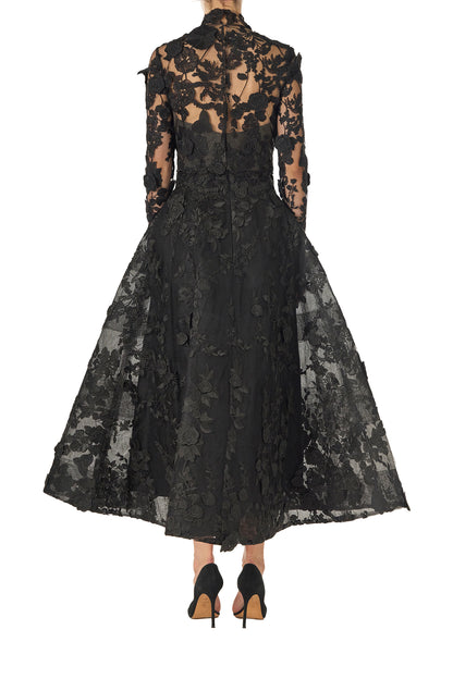 Monique Lhuillier Fall 2024 high neck, long sleeve noir lace jacket with hook and eye closure - back.