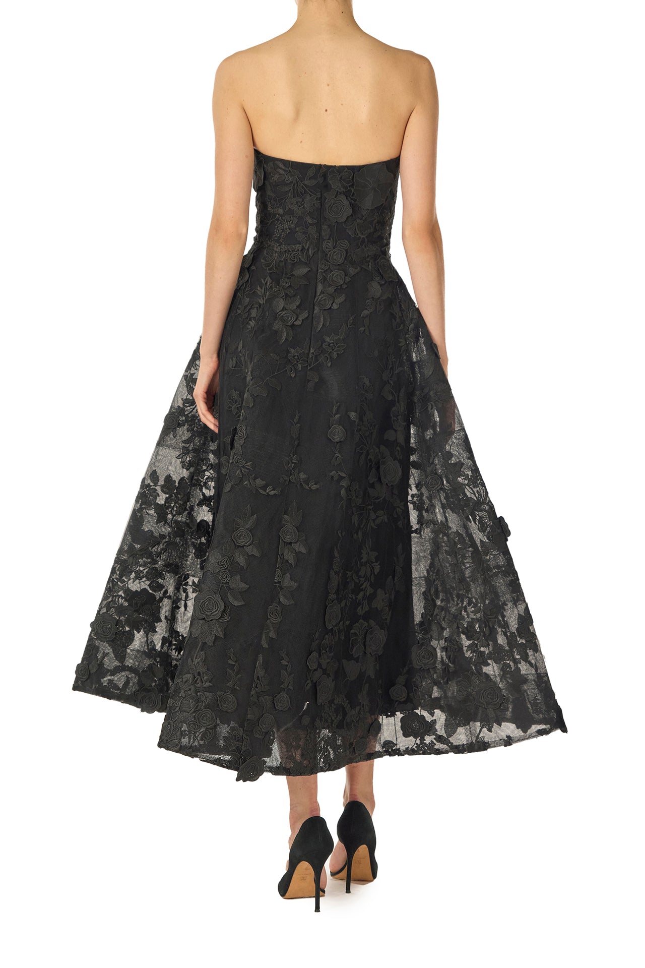Monique Lhuillier Fall 2024 tea-length, strapless dress in noir 3D lace with full skirt and fitted sweetheart bodice - back.