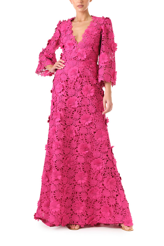 Monique Lhuillier Fall 2024 bell sleeve, floor length gown with deep v-neckline in Fuchsia 3D Guipure Lace - front.
