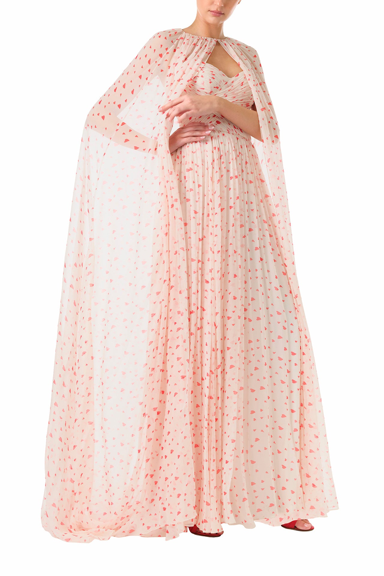 Monique Lhuillier Fall 2024 strapless chiffon gown with gathered sweetheart bodice in heart printed chiffon fabric - front with matching cape.