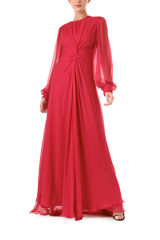 Monique Lhuillier Fall 2024 pomegranate chiffon, long sleeve gown with twist front detail, keyhole back and semi-sheer sleeves - front.